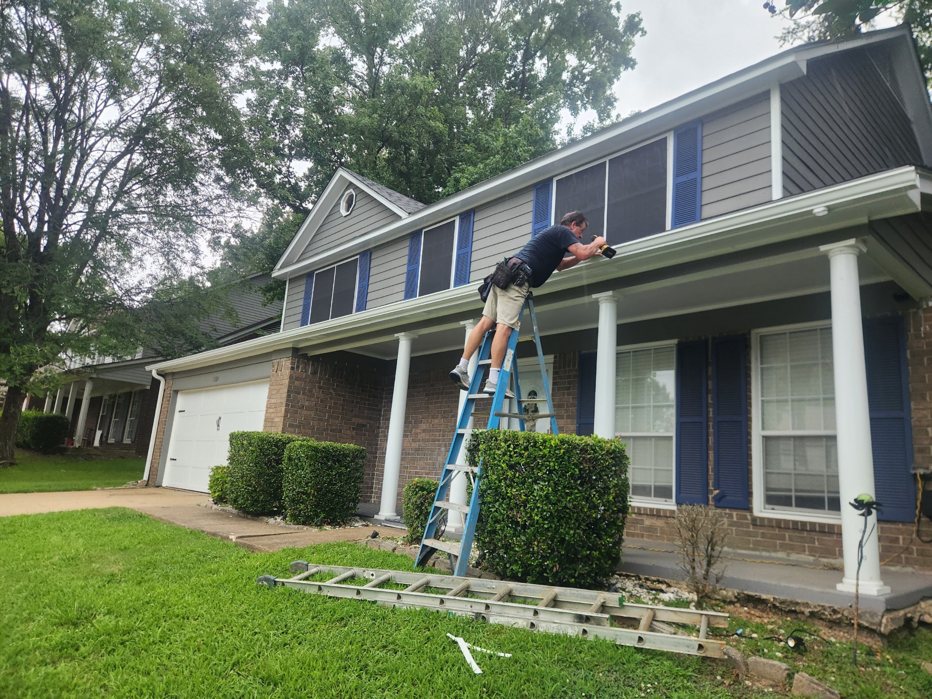 Gutters and siding installation on a residential home